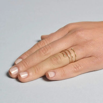 Anillo Espiral Elegance – Plata de Ley 925  baño Oro 18k